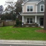 photo of two story home and lawn